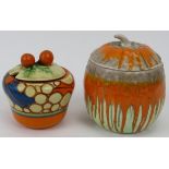 A Clarice Cliff and Shelley preserve pot. Comprising a Fantasque by Clarice Cliff preserve pot