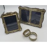 A double sterling silver photograph frame, approx 5"/12cm by 6 1/2"/16cm, a single sterling silver