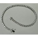 An 18ct white gold & diamond Pederzani line/tennis bracelet, approx 5cts, VS EF, boxed. Approx