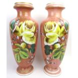 A large pair of Victorian pink opaline glass vases. Both of baluster form, the exteriors enamel