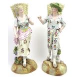 A large pair of German porcelain figurines, late 19th/20th century. Hand painted with gilt