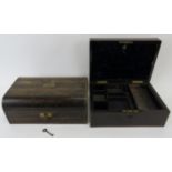 Two Victorian writing boxes. Comprising a coromandel box with key together with a rosewood box