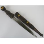 A Scottish military officer's dirk, 19th century. Ornately decorated with cast metal locket and