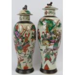 Two Chinese Nanking famille verte crackle glaze vases and covers. Overglaze painted with