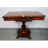A fine Victorian rosewood and mahogany turnover card table, retaining the original burgundy gilt