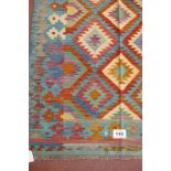 A fine Anatolian Turkish Kilim rug, vibrant diamond motifs. Pale blue, cream and red. 198cm x