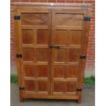 An early Mouseman burr oak panelled double wardrobe from the Kilburn workshops of Robert Thompson,