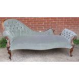 A good Victorian show-wood mahogany chaise longue, the asymmetrically shaped and raked frame with