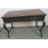 An Edwardian mahogany console table, housing two short drawers with blind fretwork detail and