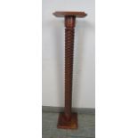 A vintage stained pine torchere, by Bramblefield wood products of Sittingbourne, with relief