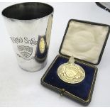 A Felsted school steeple chase silver medallion. Birmingham 1918. 36 grams. Boxed. Also a plated