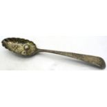 A Georgian silver berry spoon, London 1820, approx weight 1.6 troy oz/52 grams. Condition report: