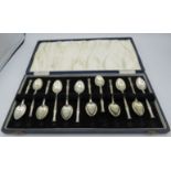 A set of 12 coffee spoons with bamboo pattern decorated handles, London 1963. Approx weight 7.8 troy