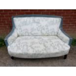 A 19th century two-seater sofa, upholstered in blue velvet and toile de jour material with brass