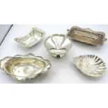 An assortment of five silver bon bon dishes, to include a rectangular one with embossed & pierced