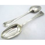 A pair of Georgian bright cut silver table spoons, London 1831, probably William Southey. Approx