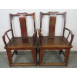 A pair of 19th century Ming jumu wood Chinese Southern officials hat armchairs, the back splats with