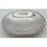 A Georg Jensen sterling silver dish. Underside engraved 'To our parents from their children 1934-