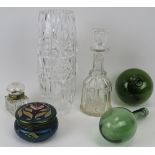 A group of glass items, 19th/early 20th century. Comprising a cut glass vase, decanter, brass