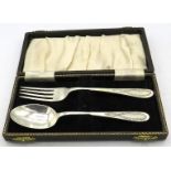 A silver christening set with spoon and fork, Birmingham 1917 & 1918, boxed. Approx weight 2 troy