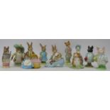A collection of Beswick Beatrix Potter figurines. Comprising Mr Benjamin Bunny, Mrs Flopsy Bunny,