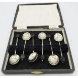 A set of six silver coffee bean terminal coffee spoons, Birmingham 1941, boxed. Approx weight 1.2
