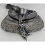 A Francesco Biasia silver leather evening bag with metal beadwork decoration and fancy tassel,