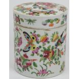 A Chinese famille rose jar and cover, 19th century. Of cylindrical form, enamel decorated with a