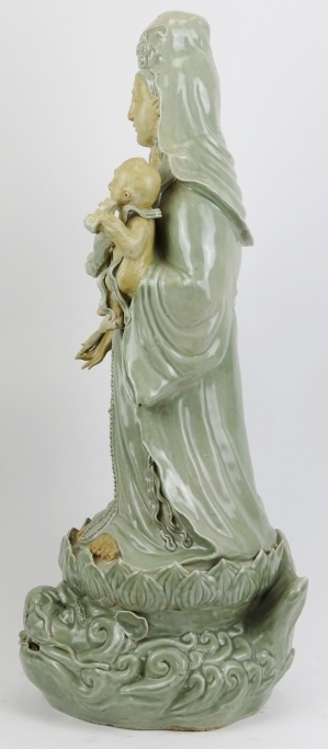 A large Chinese celadon glazed porcelain figure of Guanyin, 20th century. Depicted standing - Image 3 of 4