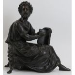 A cast bronze sculpture of the Greek philosopher Aristotle, 20th century. 11.8 in (30 cm) length, 12