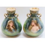 A pair of German Royal Bonn twin handled vases. Both with gilt highlighted and hand painted