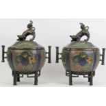 A pair of Chinese cloisonné enamelled bronze censers and covers, late 19th/early 20th century.