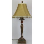 A modern European bronzed metal and glass buffet table lamp. Decorated with an artichoke above a