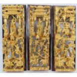 Three Chinese gilt and lacquer painted carved wood panels, 20th century. (3 items) 11.8 in (30 cm)