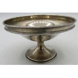 A Victorian silver pedestal bon bon dish with bead edge decoration, London 1932. Approx 2 1/2"/