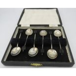 A set of six silver coffee bean terminal coffee spoons, Birmingham 1941, boxed. Approx weight 1.2