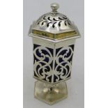 A Georgian silver pedestal pepper pot with pierced decoration and blue liner, London 1836. Silver