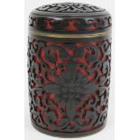A Chinese black and cinnabar lacquer jar and cover. 3.9 in (10 cm) diameter. Condition report: