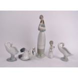 Five pieces of Lladro & Nao porcelain. 11 in (28 cm) tallest height. (5 items). Condition report: