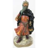 A Royal Doulton ’Good King Wenceslas’ figurine. Model number HN 2118. Green factory marks beneath.