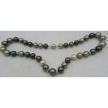 An AAAA quality 'peacock' Tahitian Southsea pearl necklace with radiant lustre and set with 8