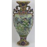 A large Japanese polychrome enamelled moriage porcelain vase, 20th century. Signed beneath. 17.9
