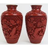 A pair of Chinese cinnabar lacquer vases. (2 items) 6 in (15.3 cm) diameter. Condition report: