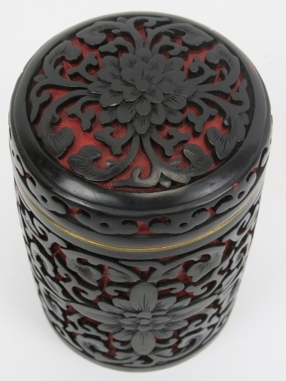 A Chinese black and cinnabar lacquer jar and cover. 3.9 in (10 cm) diameter. Condition report: - Image 2 of 4