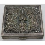 A Siamese white metal Siam Square cigarette box, embossed with figures & scrolls. Approx 3 1/2"/9cm,