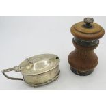 A silver mustard pot on ball feet and with blue liner, Birmingham 1946 and a wooden pepper mill with