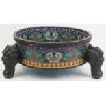 A Chinese cloisonné enamelled bronze tripod jardiniere. Decorated to both the interior and