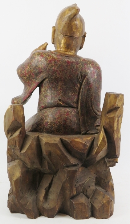 A Chinese gilt and lacquer painted carved wood figure of an immortal, 20th century. Depicted - Image 5 of 6