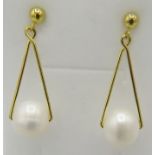 Freshwater pearl earrings, 32mm length, post back. 14k yellow gold over 925 silver. Condition