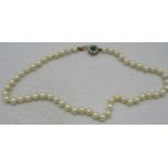 A single strand pearl necklace each pearl individually knotted with a 9ct yellow gold, pearl and